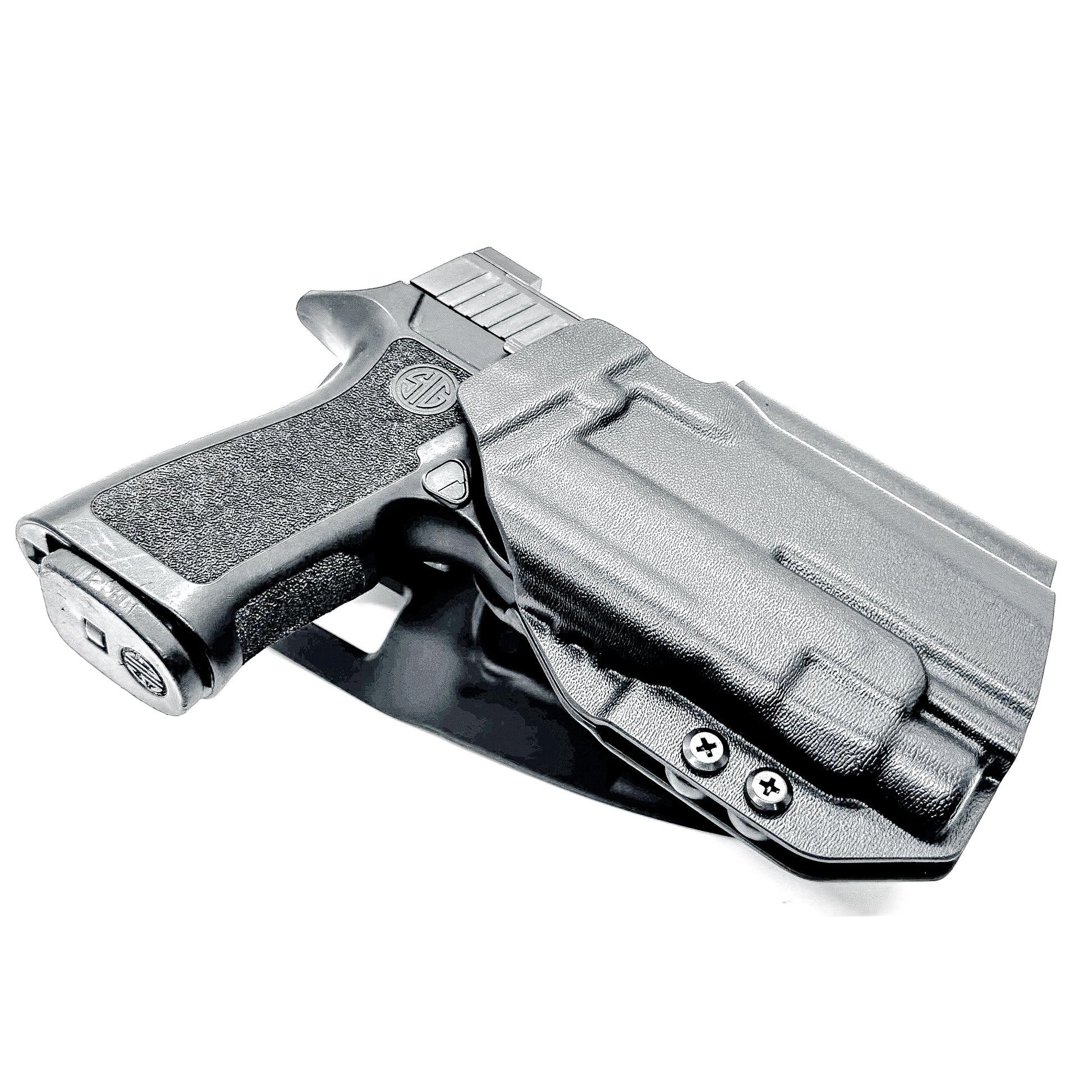 Outside Waistband OWB Duty & Competition Holster for the P320 Compact/Carry pistol with a TLR-7 HL-X  light in black with a duty Drop Attachment.
