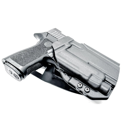 Outside Waistband OWB Duty & Competition Holster for the P320 Compact/Carry pistol with a TLR-7 HL-X  light in black with a duty Drop Attachment.