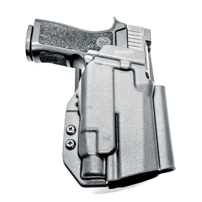 Outside Waistband OWB Duty & Competition Holster for the P320 Compact/Carry pistol with a TLR-7 HL-X  light in black with a duty Drop Attachment.