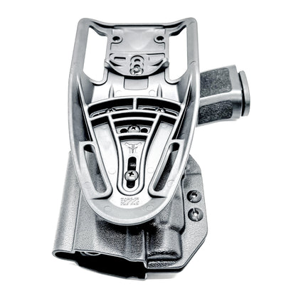 Outside Waistband OWB Duty & Competition Holster for the P320 Compact/Carry pistol with a TLR-7 HL-X  light in black with a duty Drop Attachment.