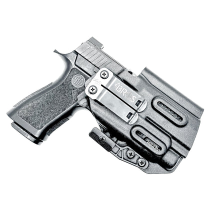 Inside Waistband IWB AIWB holster for the Sig Sauer P320 Compact/Carry pistol & Streamlight TLR-7 HL-X .  Shown in black with the DCC Monoblock and a Modwing.