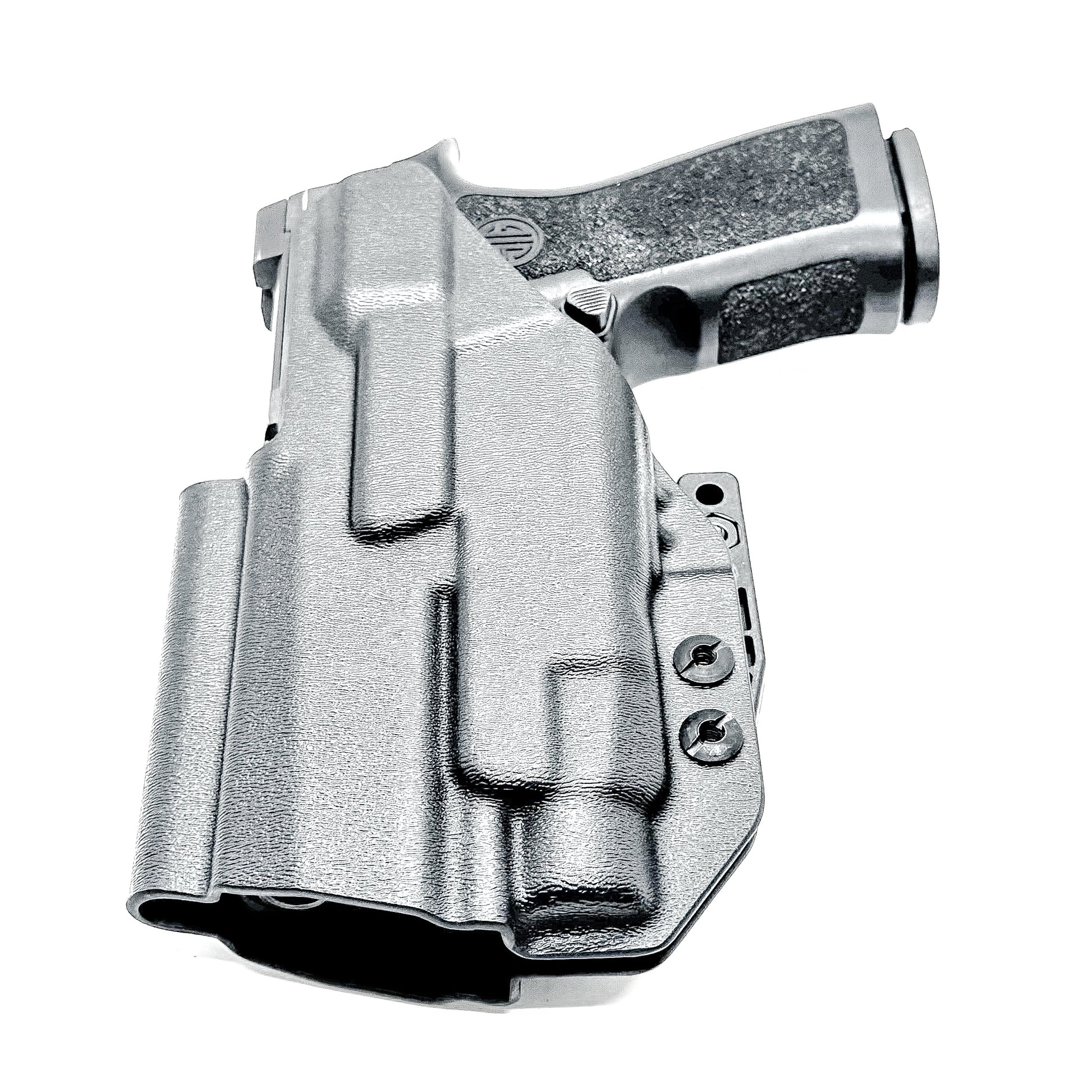 Inside Waistband IWB AIWB holster for the Sig Sauer P320 Compact/Carry pistol & Streamlight TLR-7 HL-X .  Shown in black with the DCC Monoblock and a Modwing.