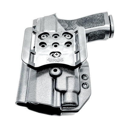 Black Outside Waistband OWB Holster for the Sig Sauer P320 Compact or Carry pistol and a Streamlight TLR-7 HL-X shown with the 4BROS 1.5" Belt Slide.