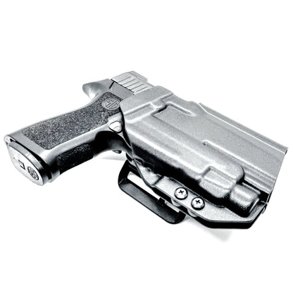 Black Outside Waistband OWB Holster for the Sig Sauer P320 Compact or Carry pistol and a Streamlight TLR-7 HL-X shown with the 4BROS 1.5" Belt Slide.