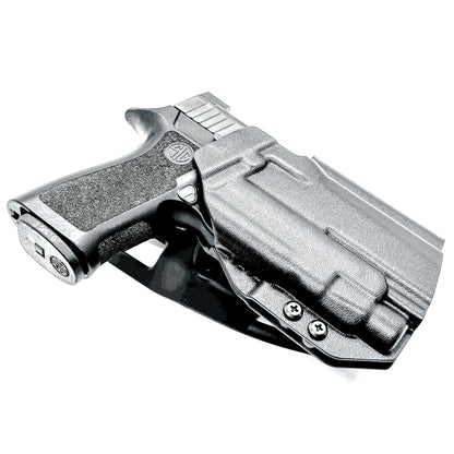 OWB Sig Sauer Compact, Carry & M18 P320 & Streamlight TLR-7 X & HL-X and Align Tactical Thumb Rest Competition Holster in black with a duty drop attachment.