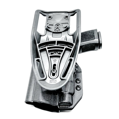 OWB Sig Sauer Compact, Carry & M18 P320 & Streamlight TLR-7 X & HL-X and Align Tactical Thumb Rest Competition Holster in black with a duty drop attachment.