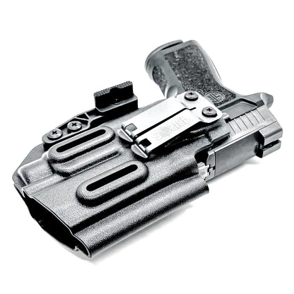 Inside Waistband Holster for Sig Sauer P320 Compact/Carry & Streamlight TLR-7 X or HL-X & Align Tactical Thumb Rest shown in black with a DCC Monoblock and a Modwing.