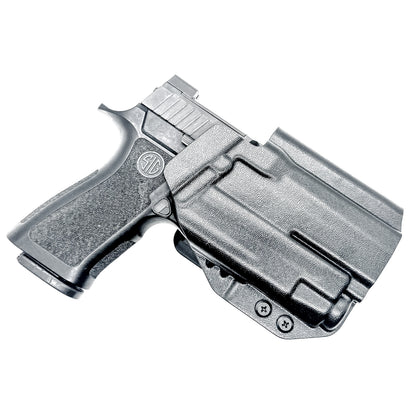 Black Outside Waistband OWB Holster for the Sig Sauer P320 Compact or Carry pistol and a Streamlight TLR-7 X or A shown with the 4BROS 1.5" Belt Slide.