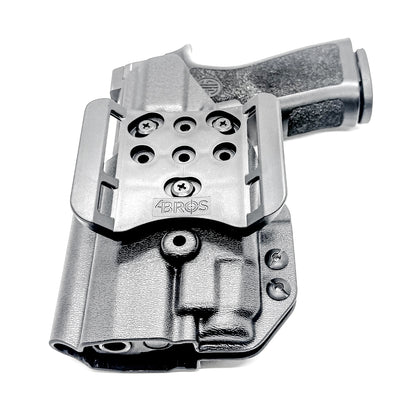 Black Outside Waistband OWB Holster for the Sig Sauer P320 Compact or Carry pistol and a Streamlight TLR-7 X or A shown with the 4BROS 1.5" Belt Slide.