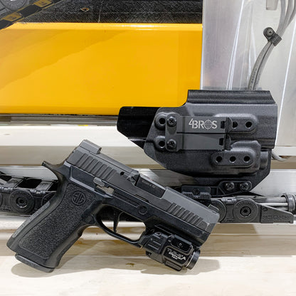 For the best IWB Kydex Inside Waistband Holster for the Sig Sauer P320 Compact, Carry or M18 & Streamlight TLR-8A & Gas Pedal shop Four Brothers Holsters  
