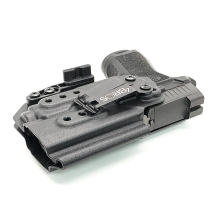 For the best IWB Kydex Inside Waistband Holster for the Sig Sauer P320 Compact, Carry or M18 & Streamlight TLR-8A & Gas Pedal shop Four Brothers Holsters  
