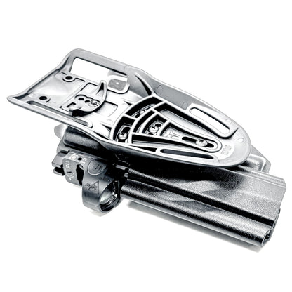Outside Waistband OWB Duty & Competition holster for the Sig Sauer P320 pistol & Streamlight TLR-7 X,  A or HL-X.  Shown in black with a Duty Drop Attachment.