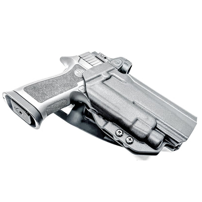 Outside Waistband OWB Duty & Competition holster for the Sig Sauer P320 pistol & Streamlight TLR-7 X,  A or HL-X.  Shown in black with a Duty Drop Attachment.