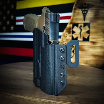 For the best OWB Outside Waistband pancake-style holster for the Sig Sauer P320 with the Streamlight TLR-1 HL or  TLR-1, shop Four Brothers 4BROS Holsters.  