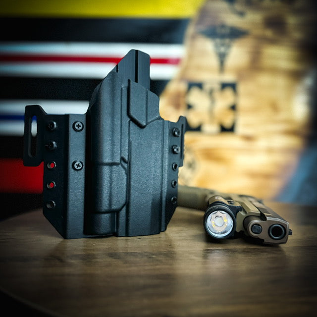 For the best OWB Outside Waistband pancake-style holster for the Sig Sauer P320 with the Streamlight TLR-1 HL or  TLR-1, shop Four Brothers 4BROS Holsters.  