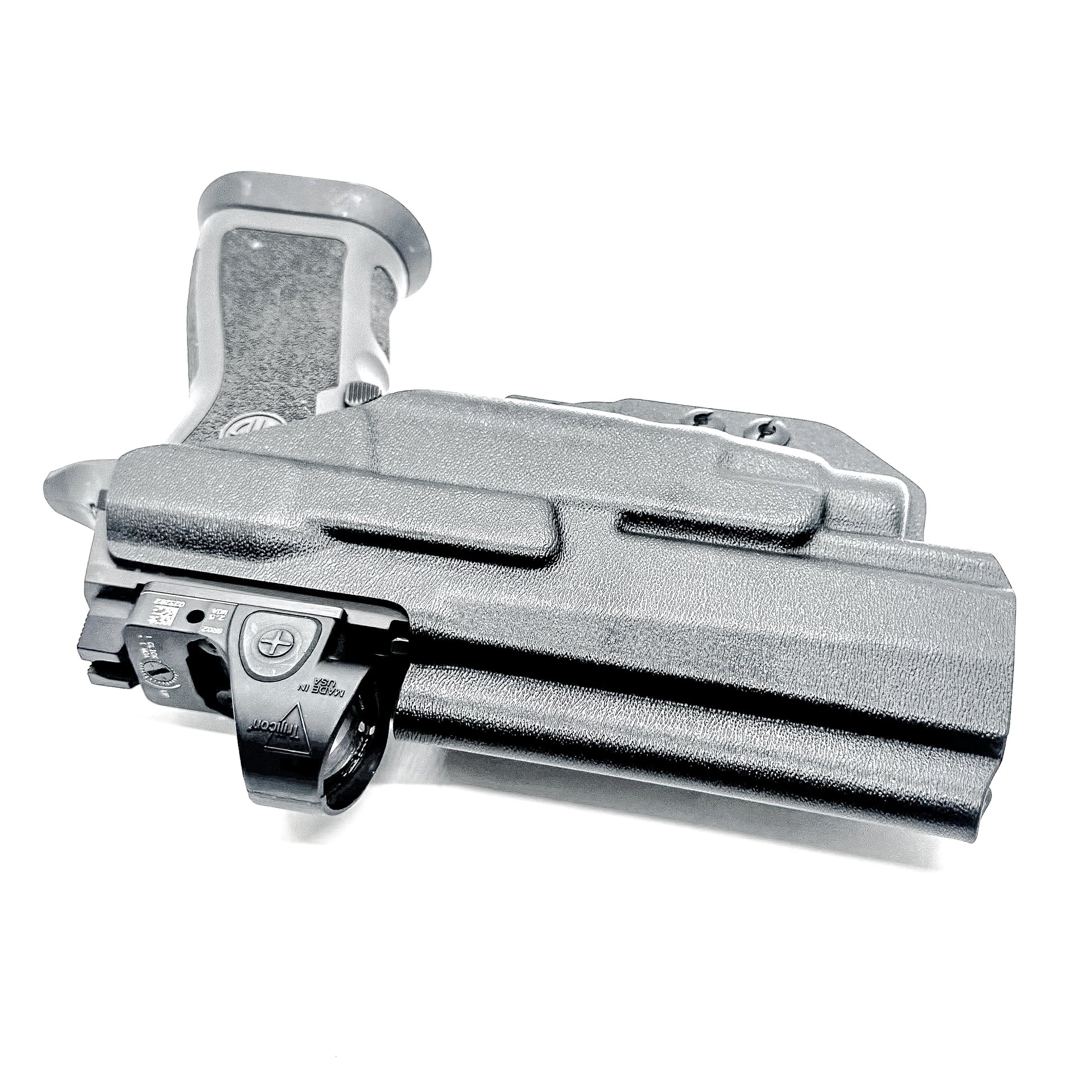 Inside Waistband IWB AIWB holster for the Sig Sauer P320 pistol & Streamlight TLR-7 X or A .  Shown in black with the DCC Monoblock and a Modwing.