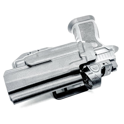 Outside Waistband OWB holster for the Sig Sauer P320 pistol & Streamlight TLR-7 X or A .  Shown in black with the 4BROS 1.5" Belt Slide.