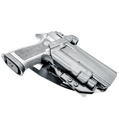 OWB Outside Waistband Competiton Holster for Sig Sauer P320 & Streamlight TLR-7 X & HL-X and Align Tactical Thumb Rest in black with a duty drop attachment.