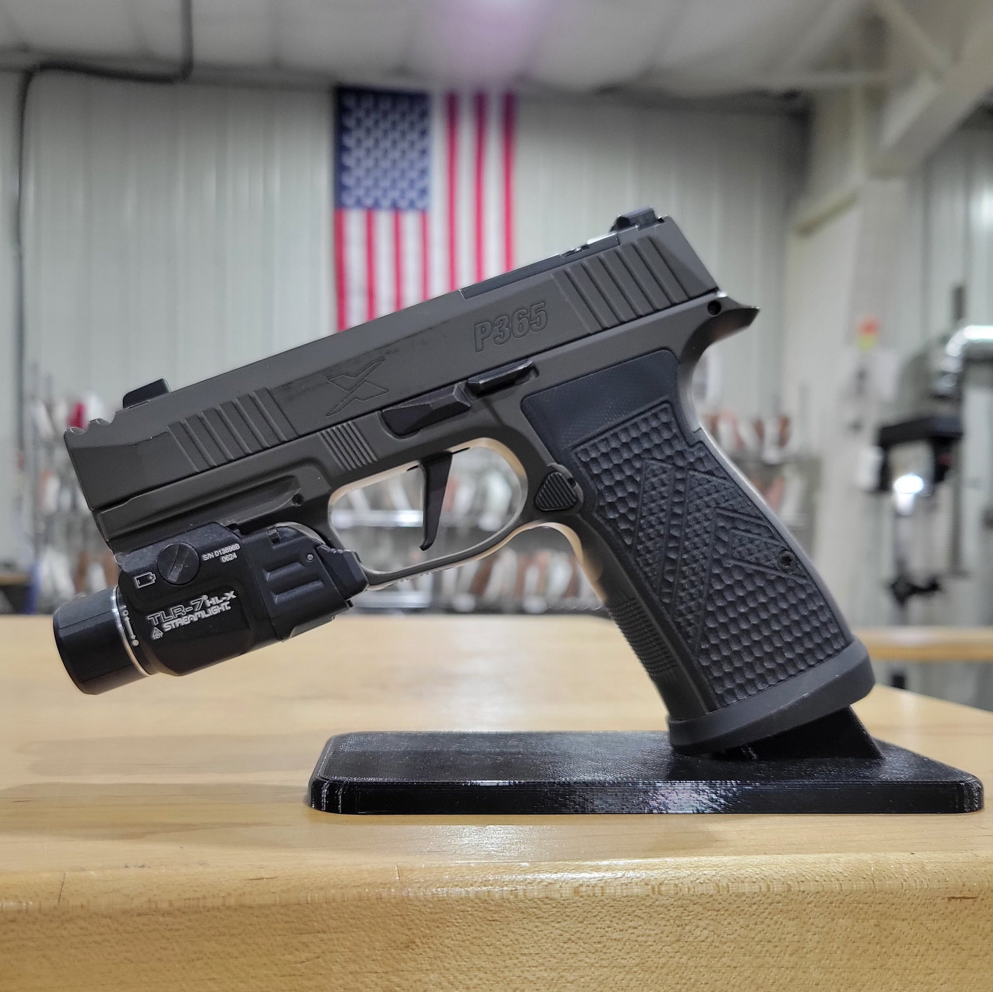 Sig Sauer P365-AXG Legion pistol holsters and stands available from  Four Brothers Holsters.