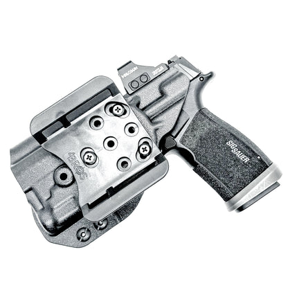Outside the Waistband OWB holster for the Sig Sauer P365-XMACRO & TLR-7 Sub light in black with 4BROS 1.5" Belt Slide attachment.
