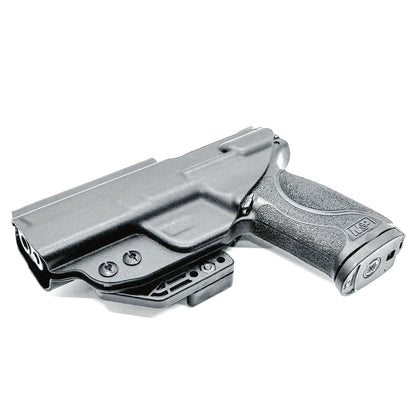 Inside waistband holster designed for Smith & Wesson M&P 1.0 and 2.0 9MM / .40 S&W 4.25" pistols with thumb safety – made by Four Brothers Holsters for secure, concealed carry.