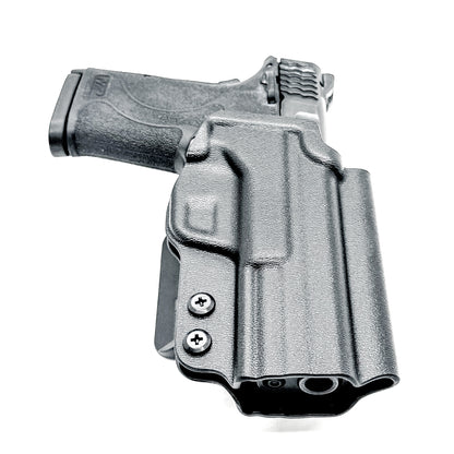 Smith & Wesson M&P 9 Shield EZ OWB Outside Waistband holster with adjustable retention, optic-ready cut.  Shown in black with a 4BROS 1.5" Belt Slide.