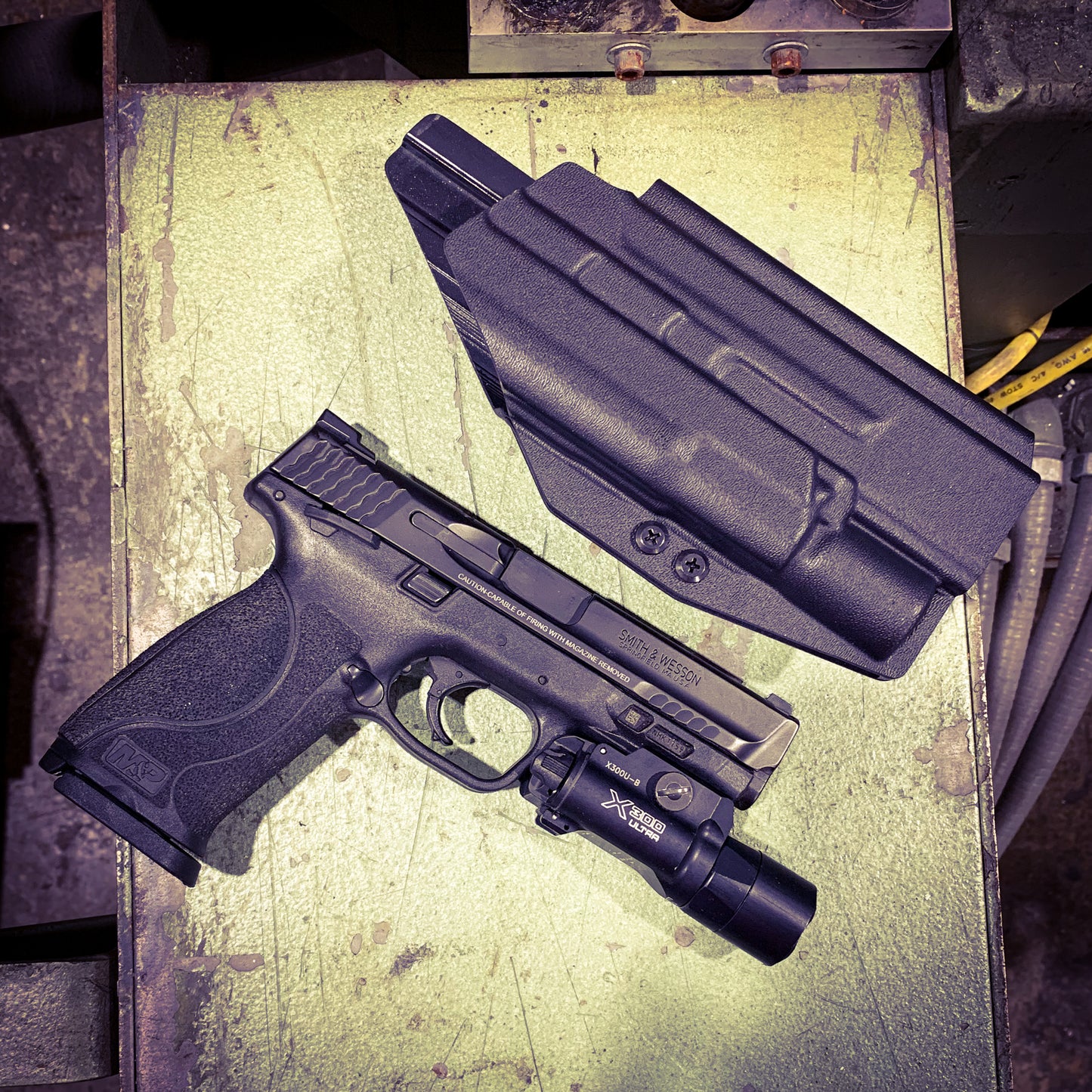 For the best Outside Waistband Holster designed for the Smith & Wesson M&P M2.0 5" pistol & Surefire X300U-A or B, X-300T-A or B shop Four Brothers Holsters.