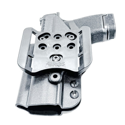 Durable OWB holster for Springfield Armory Hellcat® 3″ Micro-Compact OSP™ .380 ACP Handgun. Optic-ready, adjustable retention, and made in the USA