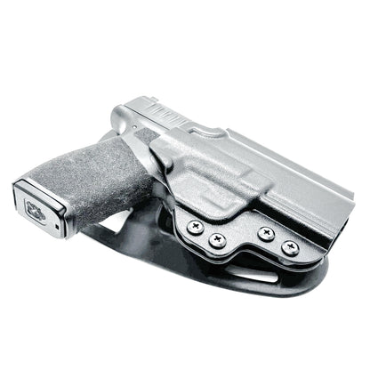Black OWB light duty and competition holster for Springfield Hellcat Pro with manual safety. Red dot ready, threaded barrel compatible. 