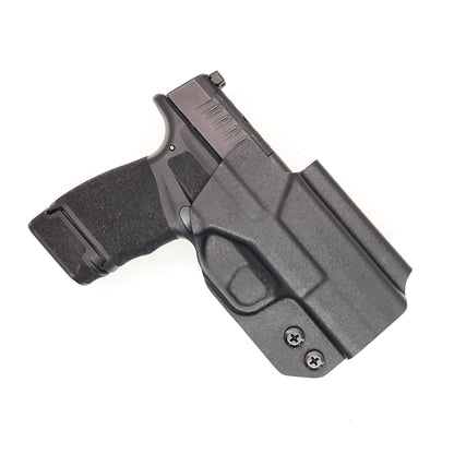 For the best OWB Outside Waistband Holster designed to fit the Springfield Armory Hellcat, shop Four Brothers Holters. Cleared for a red dot sight mounted to the pistol. Full sweat guard, adjustable retention, minimal material, and smooth edges to reduce printing. Proudly made in the USA.