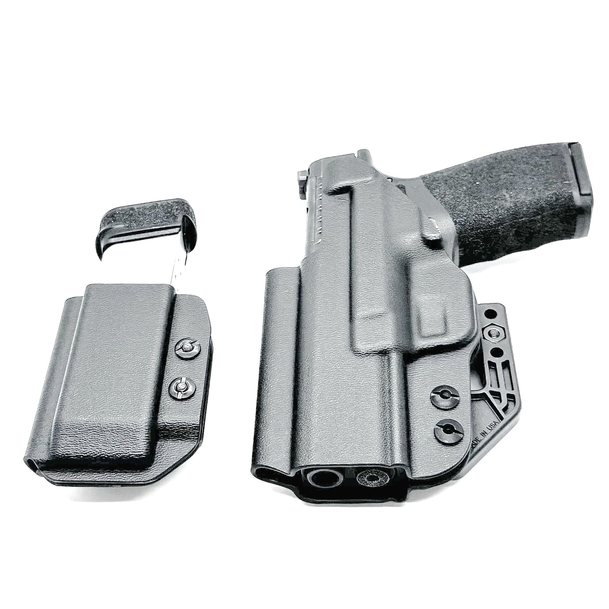 Black holster and magazine pouch set for the  Springfield Armory Hellcat Pro in black form Four Brothers Holsters.