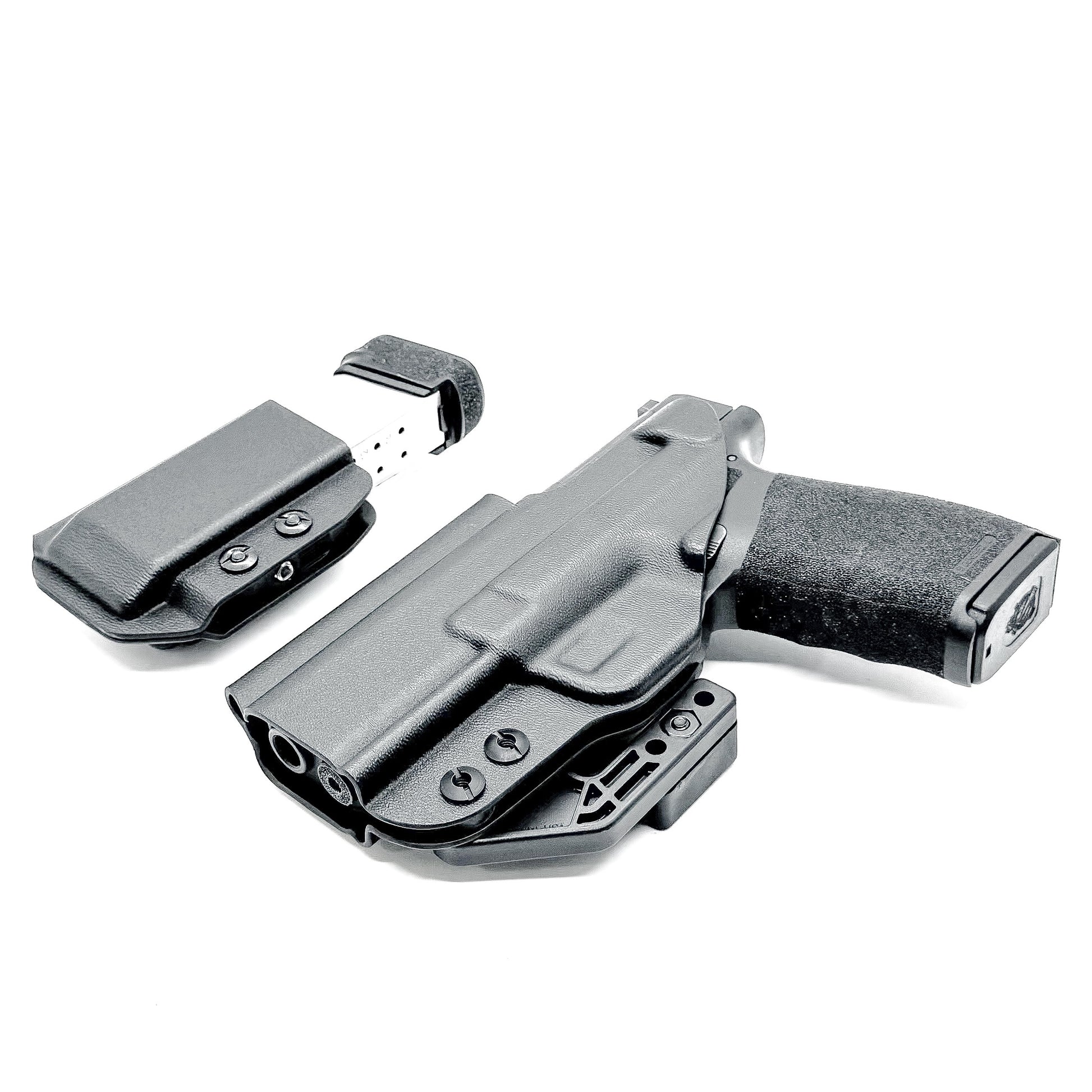 Black holster and magazine pouch set for the  Springfield Armory Hellcat Pro in black form Four Brothers Holsters.