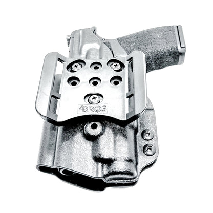 For the best Outside the Waistband OWB Kydex Holster for the Springfield Armory Hellcat Pro & SureFire XC3 Sub, shop Four Brothers Holsters.
