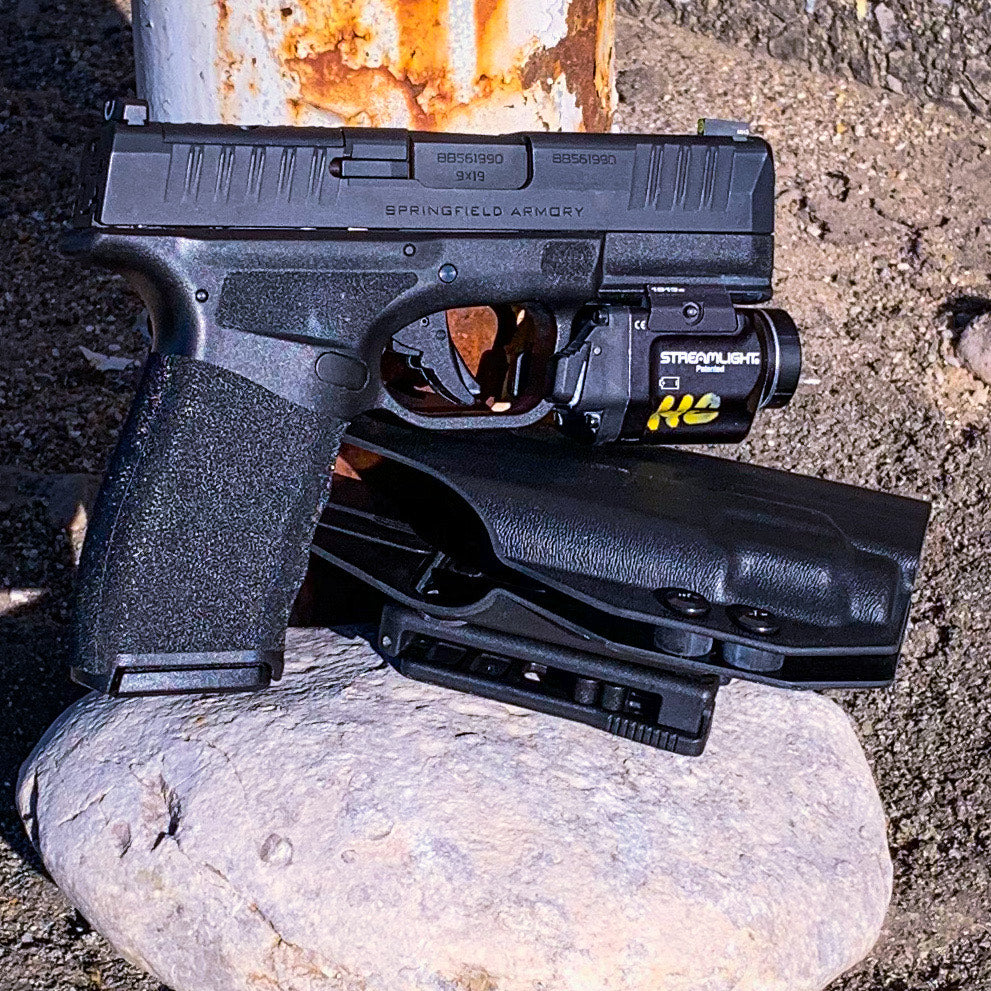 For the best Outside Waistband OWB Holster for the Springfield Hellcat Pro pistol with the Streamlight TLR-8 Sub 1913 light, shop Four Brothers 4BROS Holsters. 