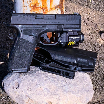 For the best Outside Waistband OWB Holster for the Springfield Hellcat Pro pistol with the Streamlight TLR-8 Sub 1913 light, shop Four Brothers 4BROS Holsters. 
