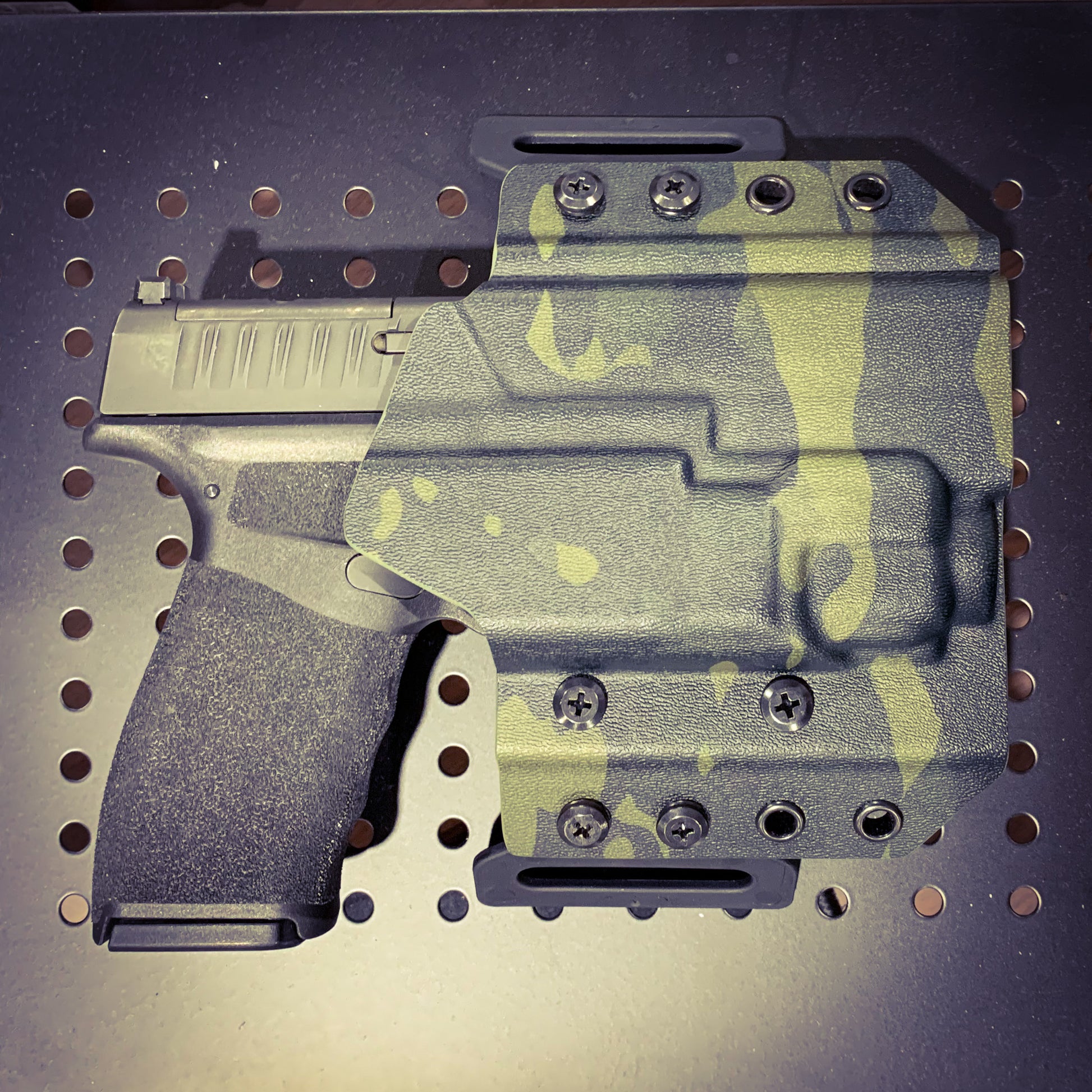 OWB Kydex holster for the Springfield Hellcat Pro with TLR-8 X & TLR-8 A. Pancake holster, adjustable retention, open muzzle, optic/red dot ready. Made in USA.