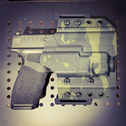 OWB Kydex holster for the Springfield Hellcat Pro with TLR-8 X & TLR-8 A. Pancake holster, adjustable retention, open muzzle, optic/red dot ready. Made in USA.