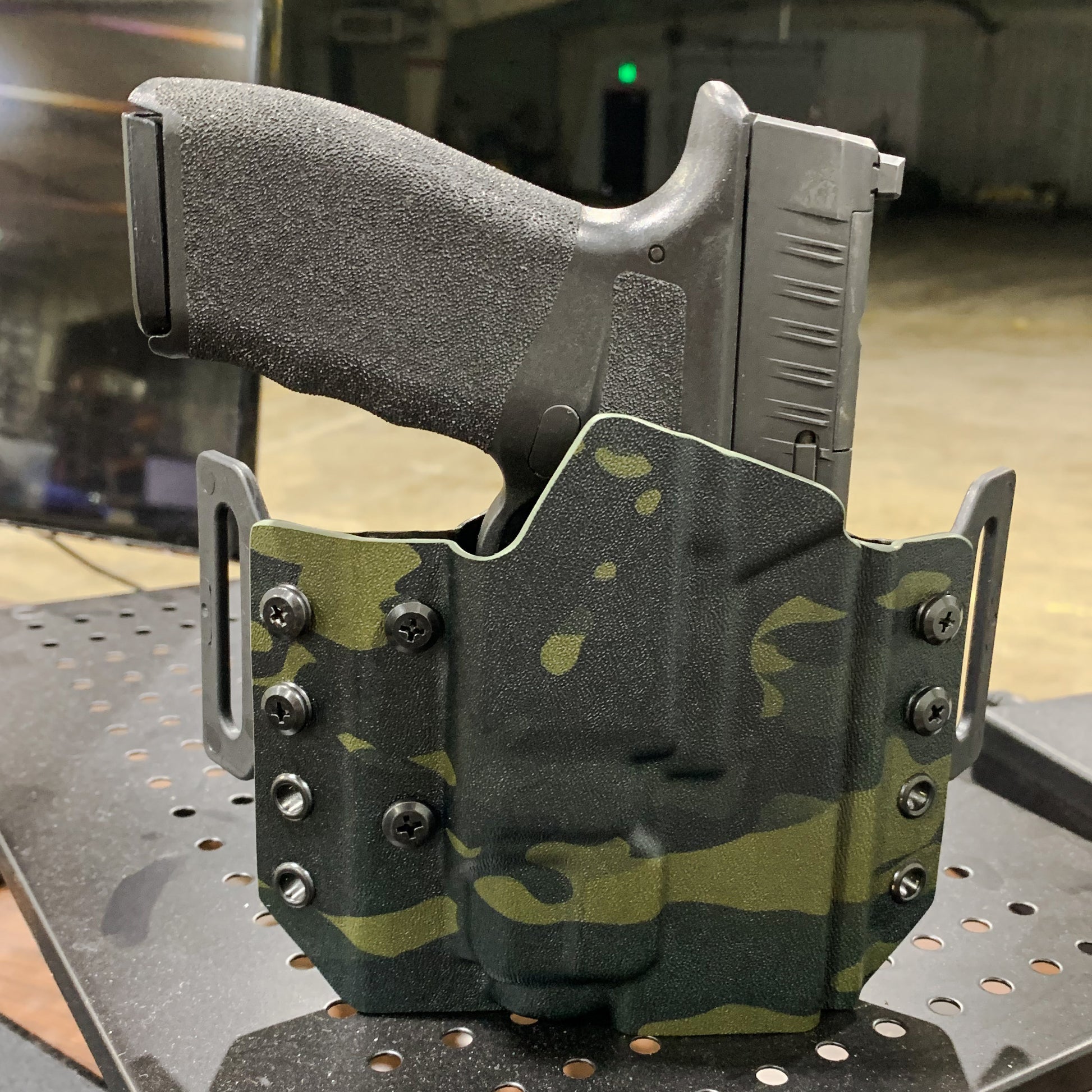 OWB Kydex holster for the Springfield Hellcat Pro with TLR-8 X & TLR-8 A. Pancake holster, adjustable retention, open muzzle, optic/red dot ready. Made in USA.