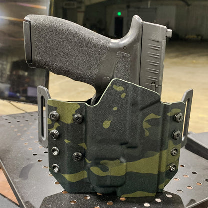 OWB Kydex holster for the Springfield Hellcat Pro with TLR-8 X & TLR-8 A. Pancake holster, adjustable retention, open muzzle, optic/red dot ready. Made in USA.