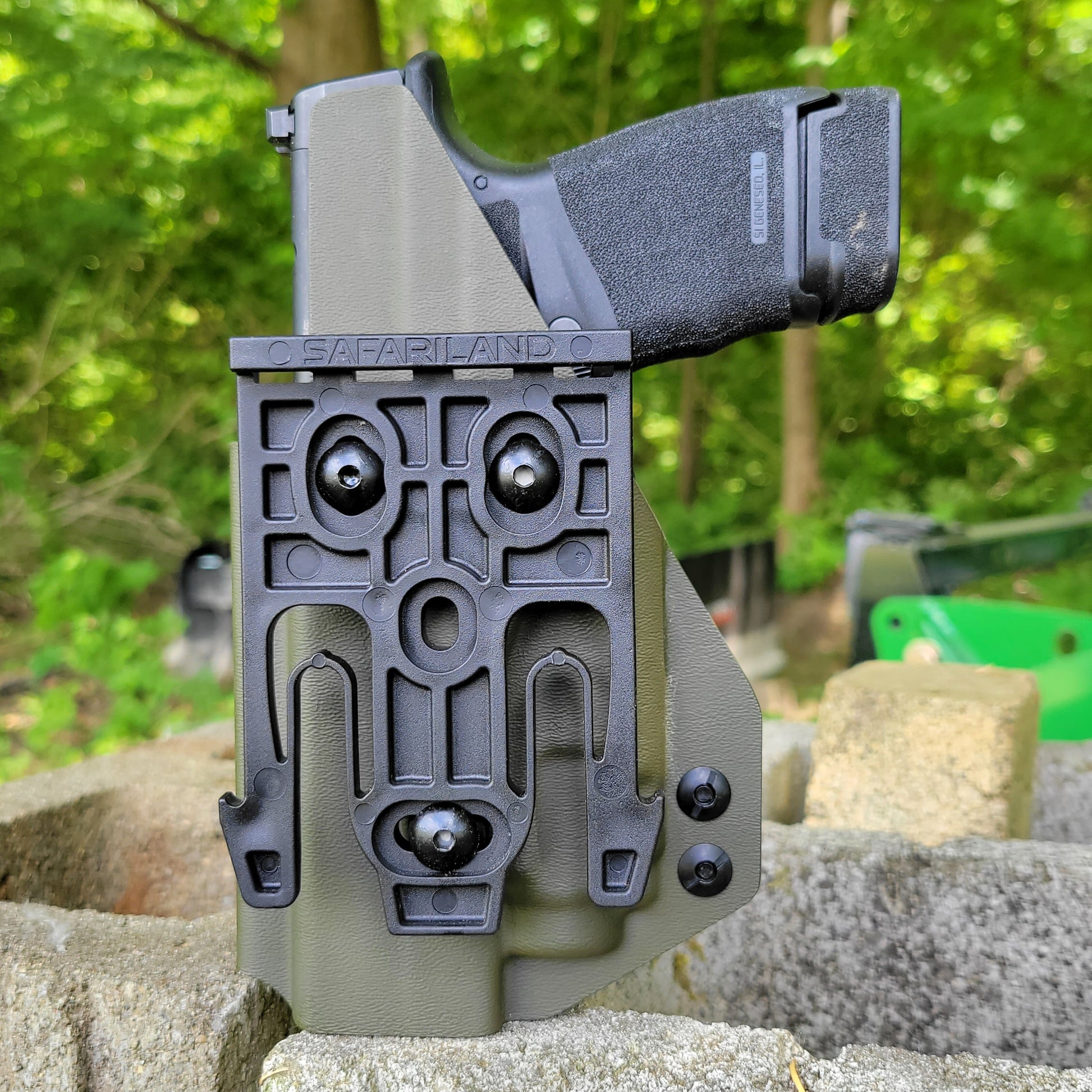 For the best Outside Waistband OWB Holster for the Springfield Hellcat Micro Compact or Hellcat RDP pistol & Streamlight TLR-8 Sub, shop Four Brothers Holsters.