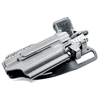 Precision-fit OWB outside the waistband duty & competition holster for the Staccato HD C4X and Surefire X300 from Four Brothers. Made in the USA. Shown In black with a Duty Drop attachment.