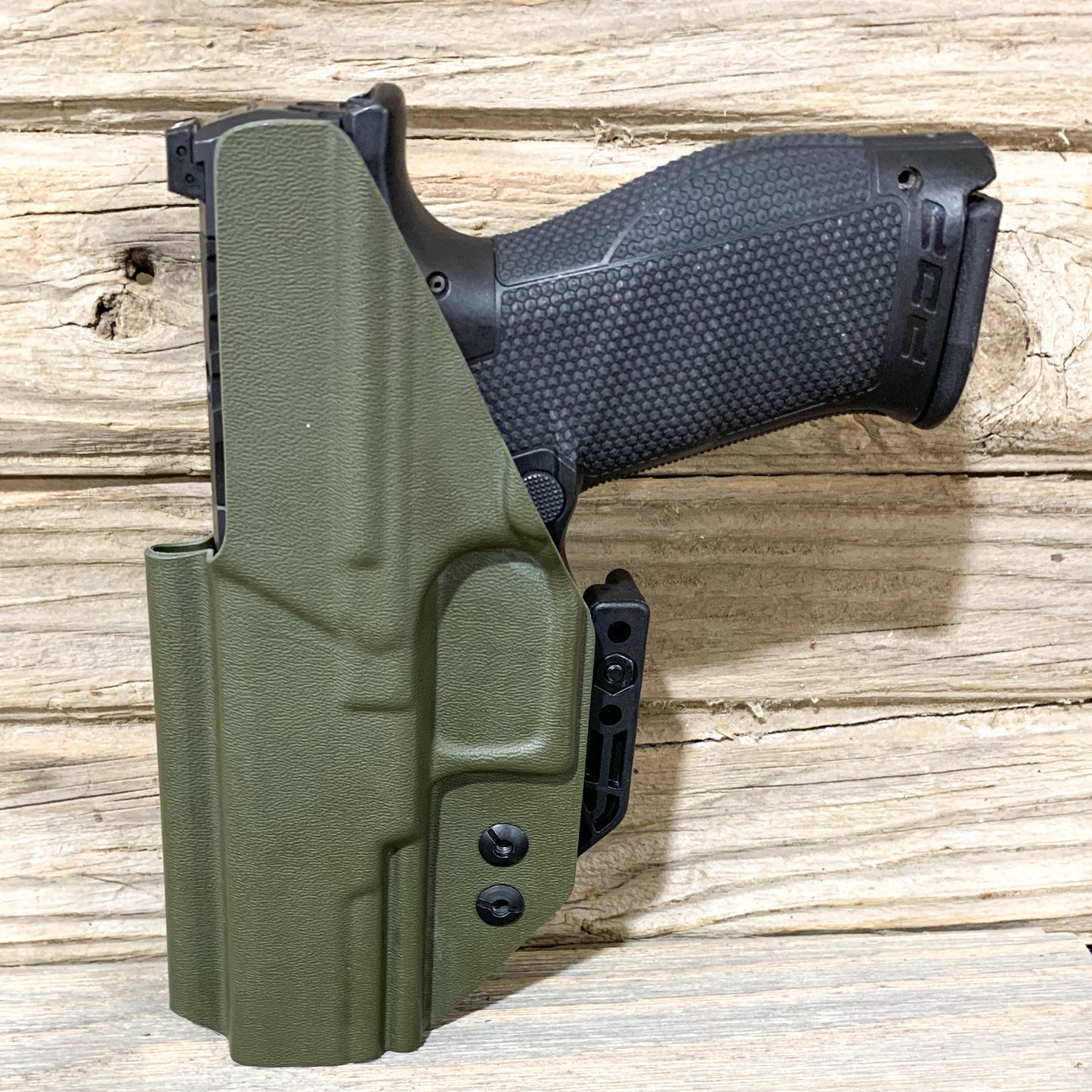 Inside Waistband IWB Kydex Holster designed to fit the Walther PDP Compact pistol. Holster profile is cut to allow red dot sights to be mounted on the pistol. This holster will fit the Full Size 4.5", Full Size 4" & Compact. Full sweat guard, adjustable retention and open muzzle for threaded barrels and compensators.