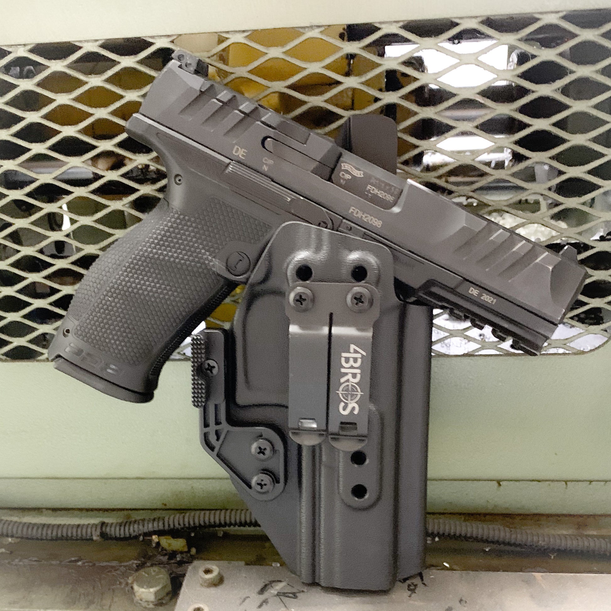 Inside Waistband IWB Holster designed to fit the Walther PDP Compact 5" pistol. Holster profile is cut to allow red dot sights to be mounted on the pistol.  This holster will fit the Full Size 5" and 5" Compact. Full sweat guard, adjustable retention and open muzzle for threaded barrels and compensators.