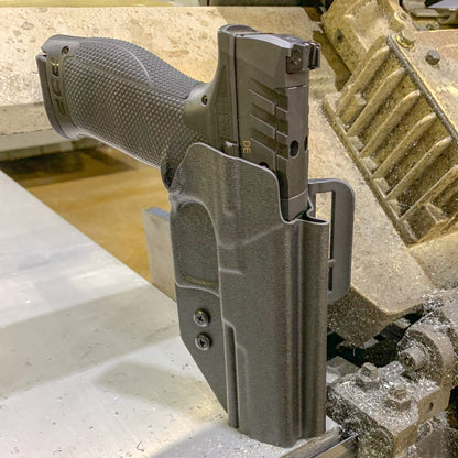 Outside Waistband Holster designed to fit the Walther PDP Compact 5" pistol. Holster profile is cut to allow red dot sights to be mounted on the pistol. Full sweat guard, adjustable retention and open muzzle for threaded barrels and compensators.