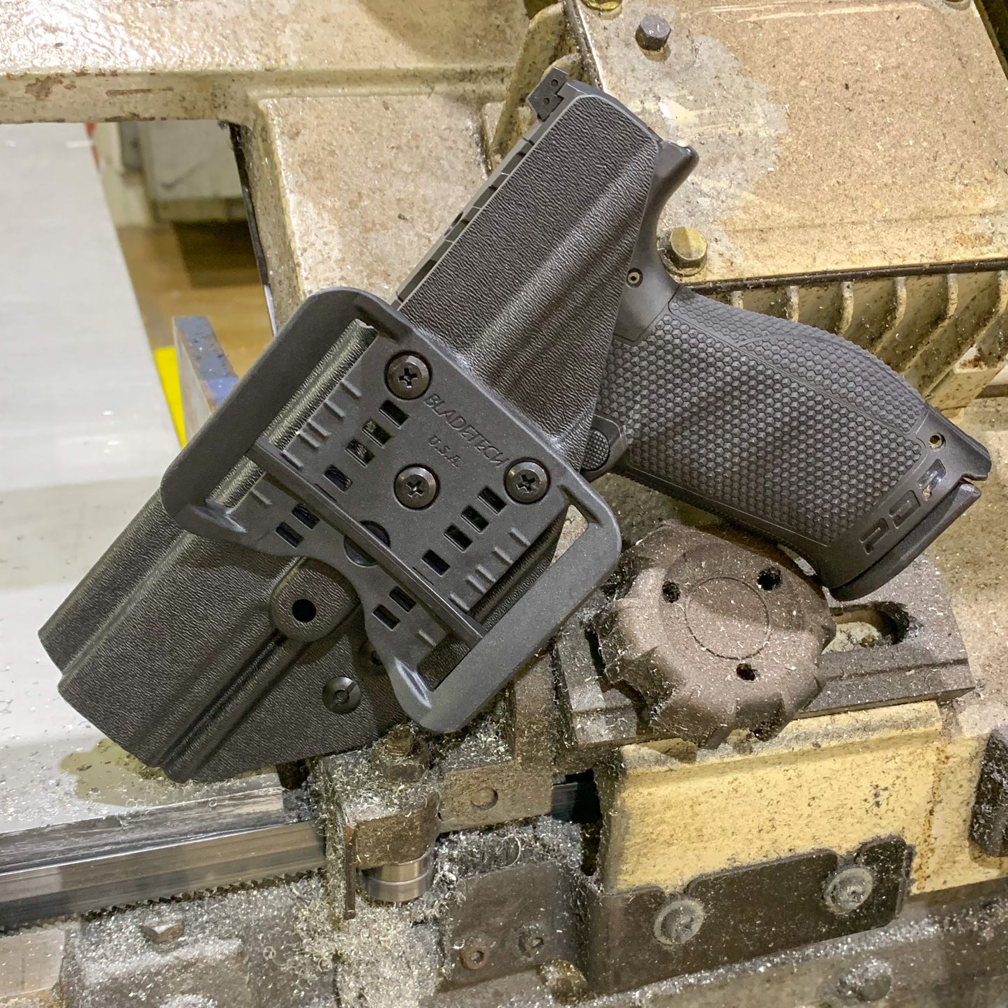 Outside Waistband Holster designed to fit the Walther PDP Compact 5" pistol. Holster profile is cut to allow red dot sights to be mounted on the pistol. Full sweat guard, adjustable retention and open muzzle for threaded barrels and compensators.