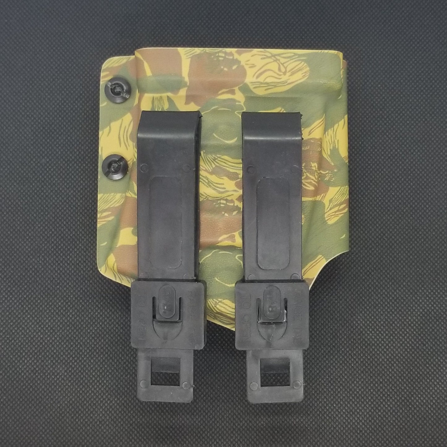 Outside Waistband AK-47 magazine pouch designed to fit Magpul Pmag, select Pro Mag and Tapco magazines. Tek-Lok Belt attachment fits belts up to 2.25" wide.