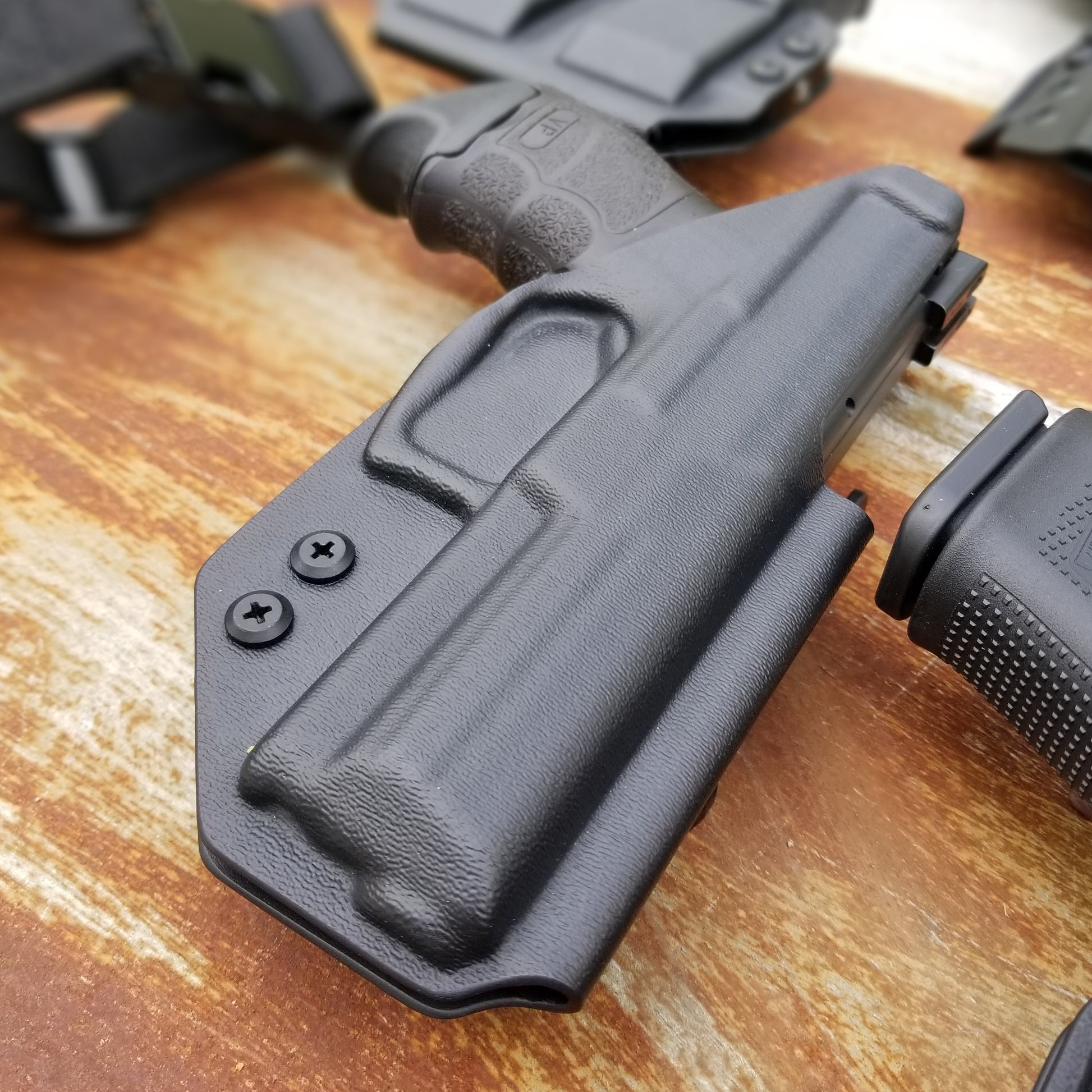 For the best Outside Waistband OWB Holster for the Heckler & Koch H&K HK VP9 shop Four Brothers 4BROS Holsters.  Made in the USA.  Cleared for red dot sights.
