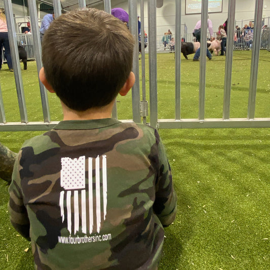 Limited edition woodland camo long sleeve shirt, modeled by the future executives of 4Bros LLC.  A fun one-time project from Four Brothers 4BROS Holsters.