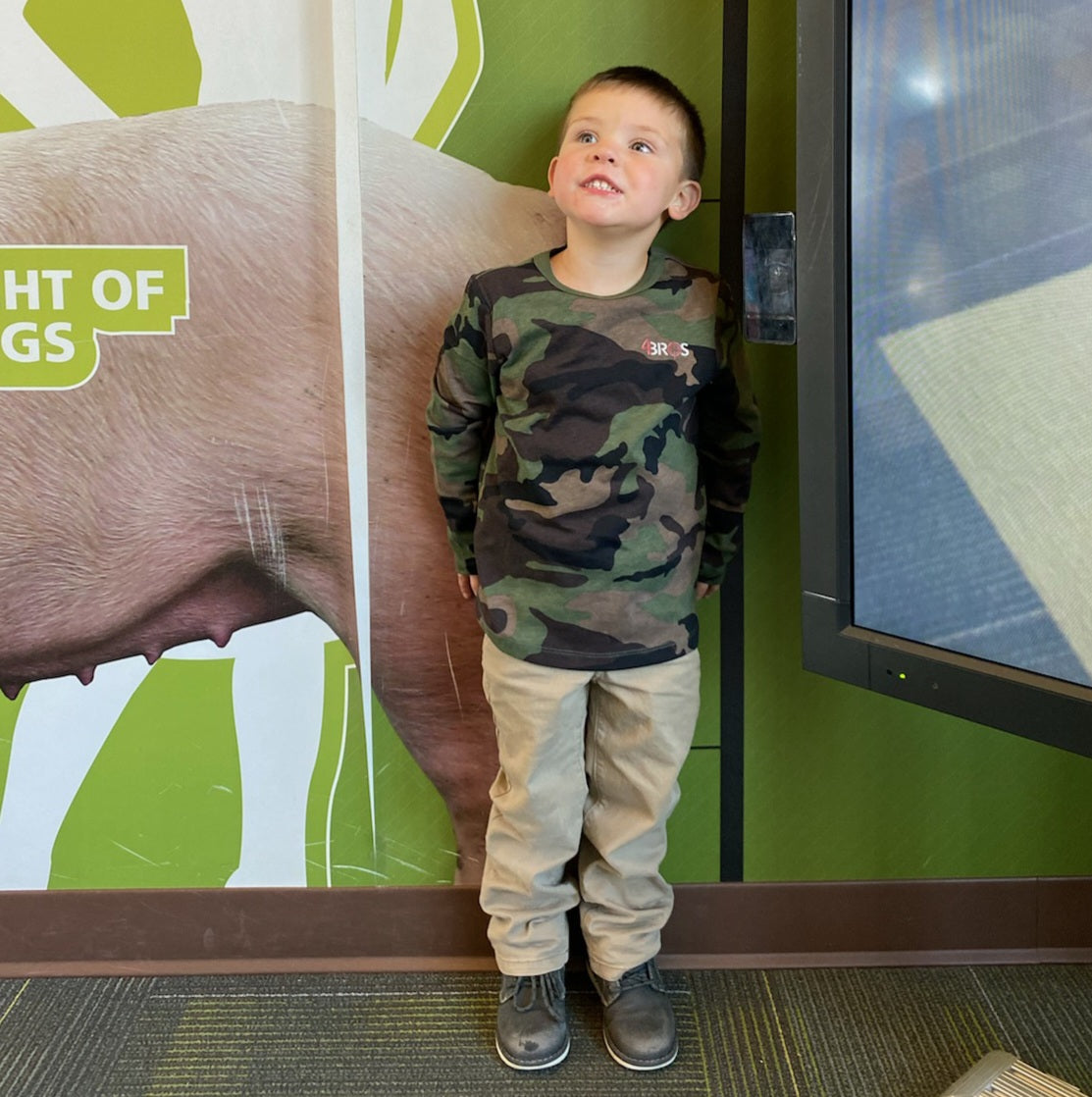Limited edition woodland camo long sleeve shirt, modeled by the future executives of 4Bros LLC.  A fun one-time project from Four Brothers 4BROS Holsters.
