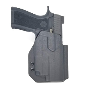 Outside Waistband Kydex Thermoplastic Holster designed to fit the Sig Sauer P320 Carry, P320 Compact and P320 M18 pistols with Olight PL-Mini 2 weapon mounted light and GoGun USA Gas Pedal CG. Adjustable retention, profile cut for red dot sights. Holster is proudly made in USA by Law Enforcement and Military Veterans